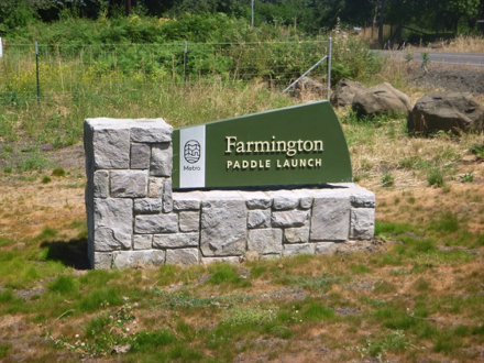 Entrance sign at SW River Rd, Hillsboro, Oregon - near intersection of Farmington Rd